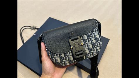 dior mini saddle pouch on chain|genuine dior saddle bag.